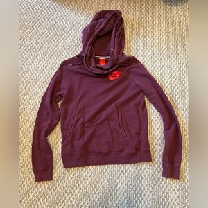 Nike women’s size medium cowl neck hoodie; maroon/magenta color. Like new.
